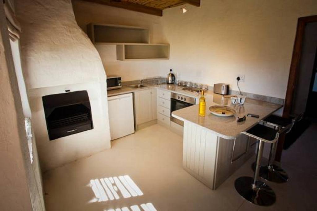 Vrisch Gewagt Boutique Self-Catering Olive Farm Guest House พรินซ์อัลเบิร์ต ห้อง รูปภาพ